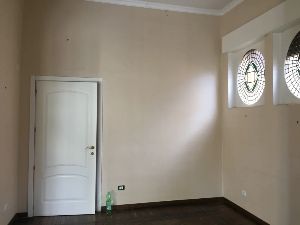 Zona giorno di casa liberty, prima del restauro